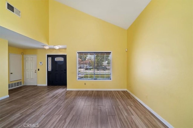 13969 Chervil Ct, Moreno Valley, CA 92553 - foyer featuring high vaulted ceiling and wood finished floors