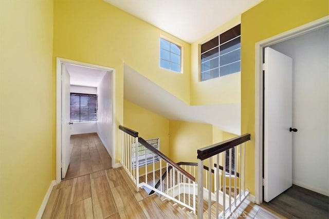 13969 Chervil Ct, Moreno Valley, CA 92553 - corridor with an upstairs landing and wood finished floors