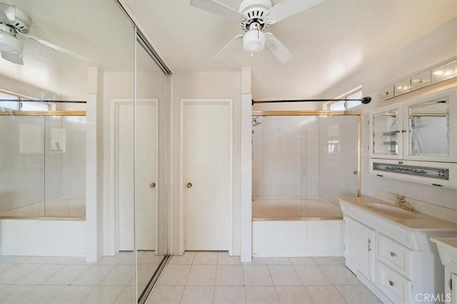 13969 Chervil Ct, Moreno Valley, CA 92553 - bathroom with shower / bath combination with glass door, vanity, ceiling fan, and tile patterned floors