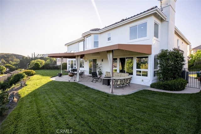 24736 Wooded Vis, West Hills, CA 91307 - rear view of house featuring stucco siding, a patio, and a chimney