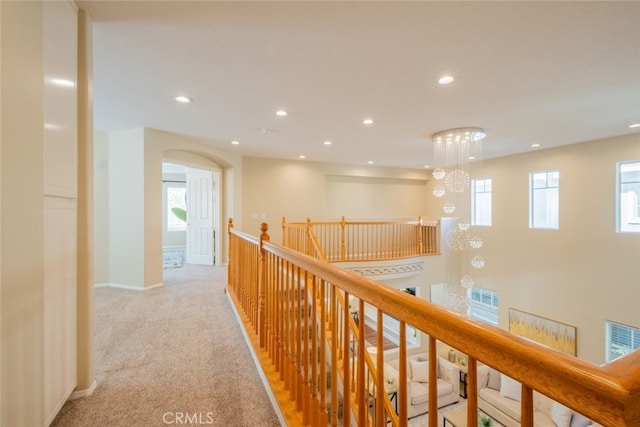 4892 Borders St, Simi Valley, CA 93063 - hall with recessed lighting, an upstairs landing, light colored carpet, healthy amount of natural light, and a chandelier