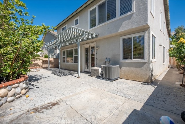 4892 Borders St, Simi Valley, CA 93063 - back of property featuring stucco siding, a pergola, and a patio area
