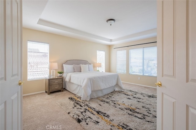4892 Borders St, Simi Valley, CA 93063 - bedroom with carpet floors, a raised ceiling, and multiple windows