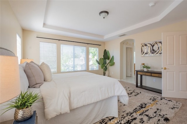 4892 Borders St, Simi Valley, CA 93063 - carpeted bedroom featuring a raised ceiling and arched walkways