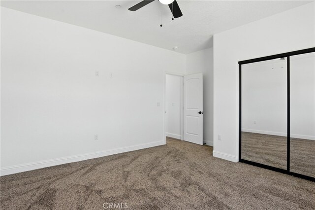 15323 Turquoise Rd, Apple Valley, CA 92307 - unfurnished bedroom featuring carpet, a closet, and a ceiling fan