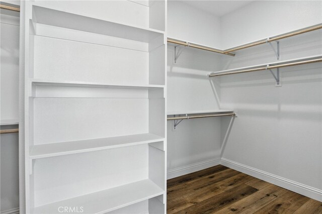 15323 Turquoise Rd, Apple Valley, CA 92307 - walk in closet featuring wood finished floors