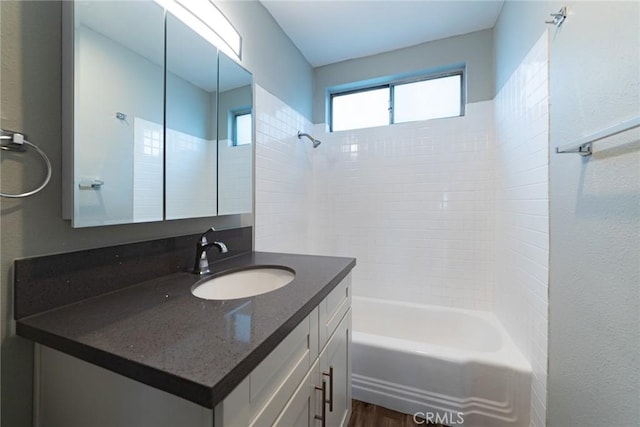 1106 Pacific Ave, Long Beach, CA 90813 - full bath featuring vanity, shower / washtub combination, and wood finished floors