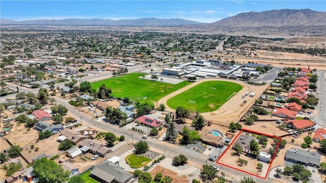 7165 Lyons Ave, Hesperia, CA 92345 - aerial view of residential area featuring mountains and property parcel outlined