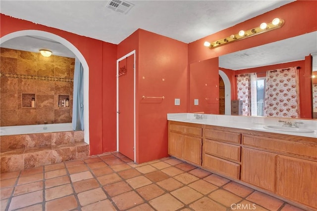 7165 Lyons Ave, Hesperia, CA 92345 - bathroom featuring double vanity and tiled bath