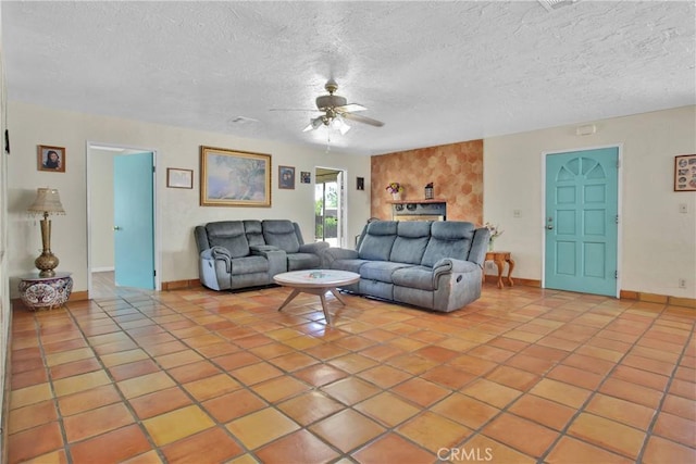 7165 Lyons Ave, Hesperia, CA 92345 - tiled living area with a ceiling fan and a textured ceiling