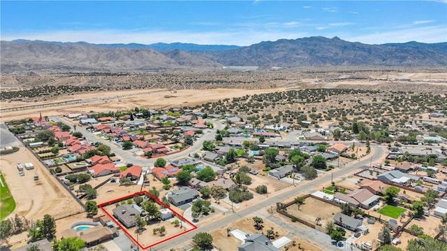 7165 Lyons Ave, Hesperia, CA 92345 - aerial view of residential area with property parcel outlined and a mountainous background