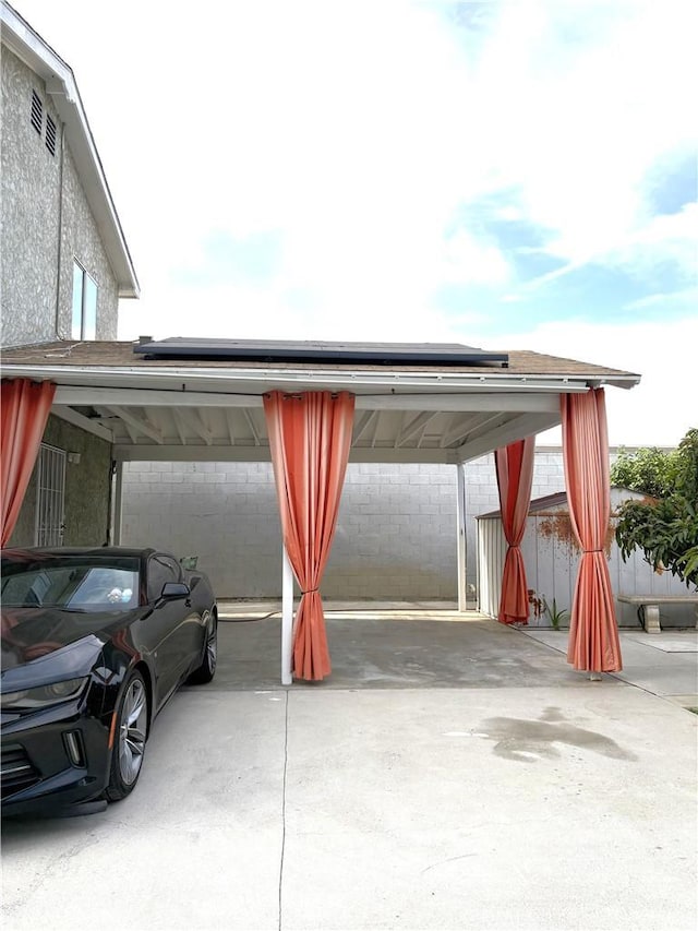 10914 S Osage Ave, Inglewood, CA 90304 - view of vehicle parking with a garage and concrete driveway