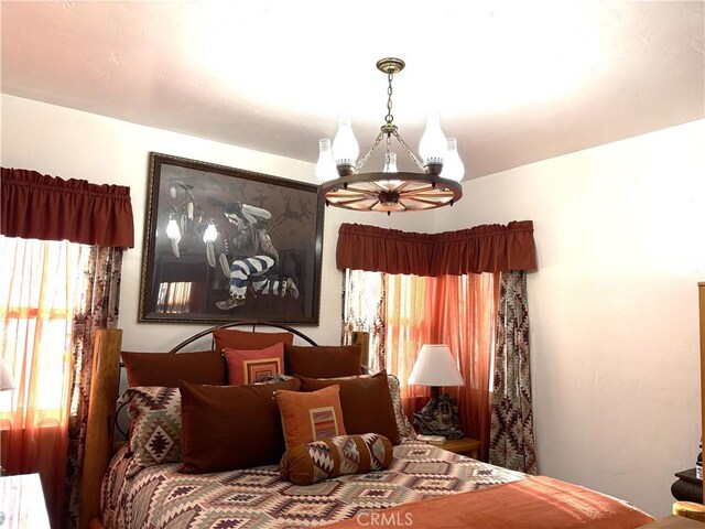 10914 S Osage Ave, Inglewood, CA 90304 - bedroom featuring a chandelier