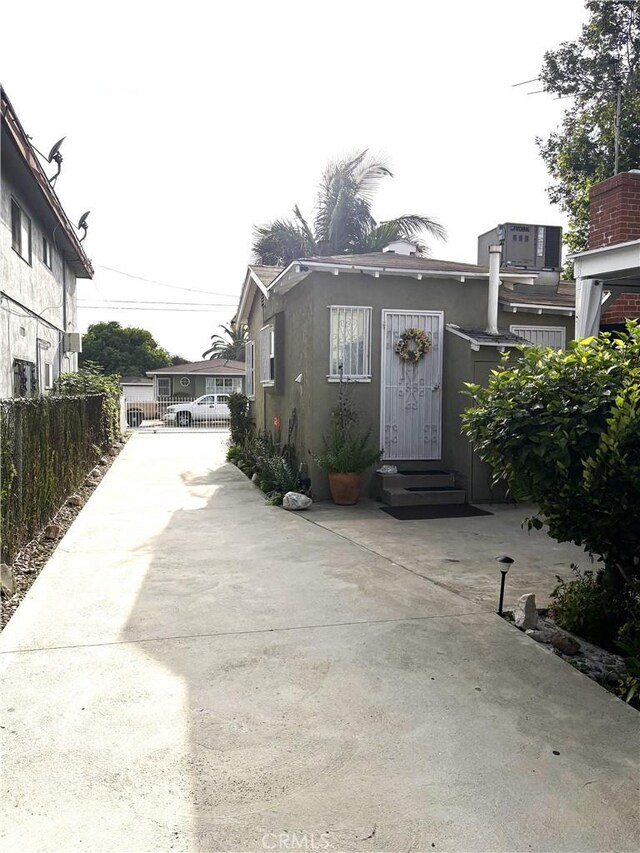 10914 S Osage Ave, Inglewood, CA 90304 - exterior space featuring entry steps, a gate, and a gated entry
