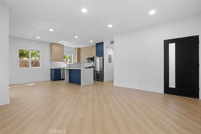 542 N Keystone St, Burbank, CA 91506 - kitchen with stainless steel appliances, a kitchen island, light countertops, recessed lighting, and light wood finished floors