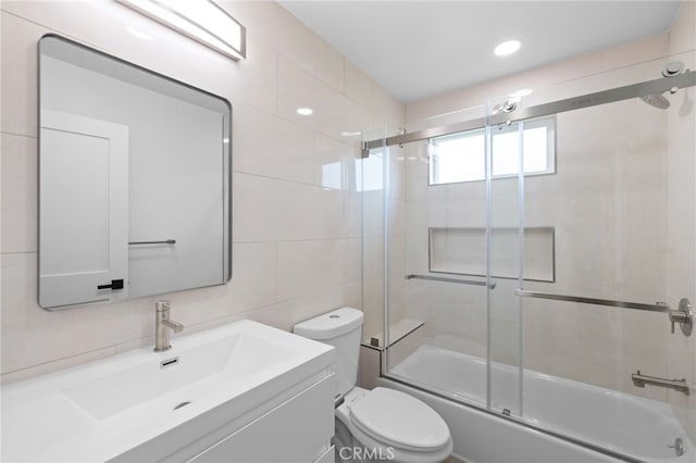 542 N Keystone St, Burbank, CA 91506 - full bathroom featuring vanity, shower / bath combination with glass door, and tile walls