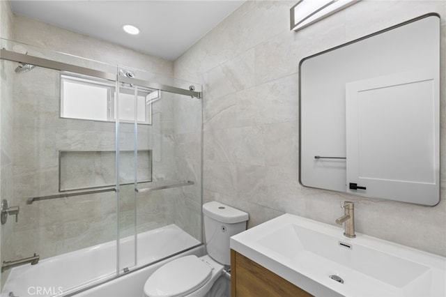 542 N Keystone St, Burbank, CA 91506 - full bathroom with tile walls, vanity, and bath / shower combo with glass door