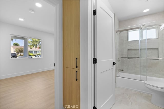 542 N Keystone St, Burbank, CA 91506 - bathroom featuring combined bath / shower with glass door, healthy amount of natural light, recessed lighting, and wood finished floors