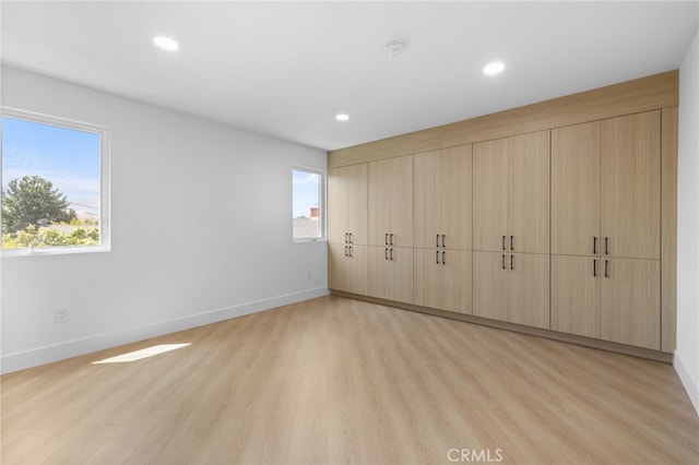542 N Keystone St, Burbank, CA 91506 - unfurnished bedroom with multiple windows, light wood-style flooring, and recessed lighting
