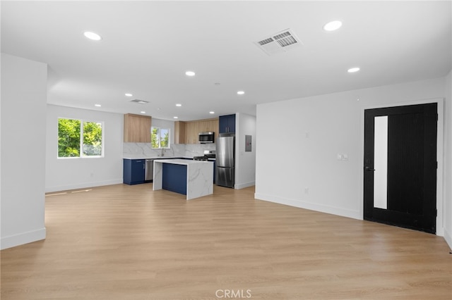 542 N Keystone St, Burbank, CA 91506 - unfurnished living room with recessed lighting and light wood-style floors