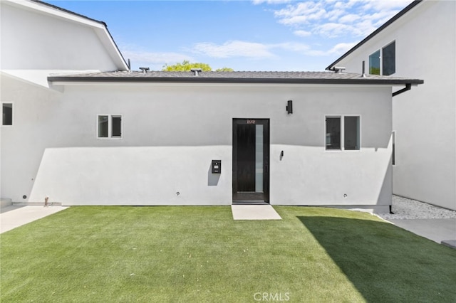 542 N Keystone St, Burbank, CA 91506 - back of house featuring a lawn and stucco siding