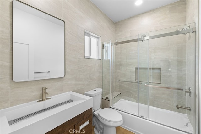542 N Keystone St, Burbank, CA 91506 - full bathroom with tile walls, vanity, and enclosed tub / shower combo