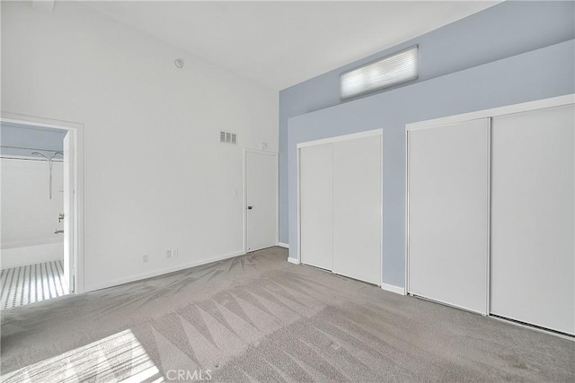 11154 Huston St Unit 7, North Hollywood, CA 91601 - unfurnished bedroom featuring carpet and two closets