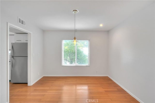 11154 Huston St Unit 7, North Hollywood, CA 91601 - unfurnished dining area with light wood-type flooring and recessed lighting