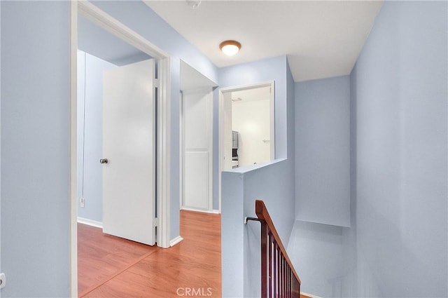 11154 Huston St Unit 7, North Hollywood, CA 91601 - hallway featuring an upstairs landing and wood finished floors