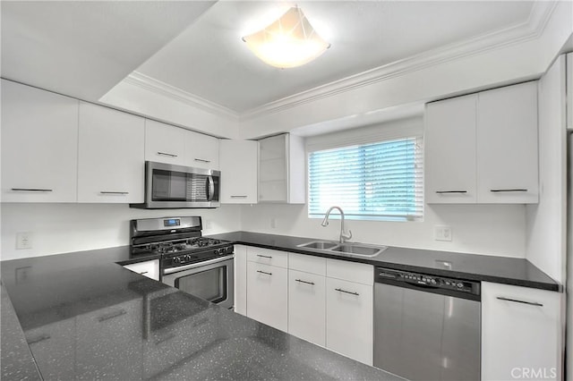11154 Huston St Unit 7, North Hollywood, CA 91601 - kitchen with stainless steel appliances, ornamental molding, white cabinets, modern cabinets, and dark stone counters