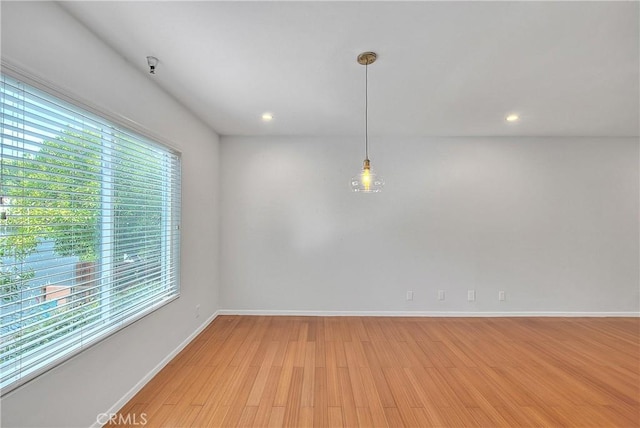 11154 Huston St Unit 7, North Hollywood, CA 91601 - empty room featuring plenty of natural light, light wood-type flooring, and recessed lighting