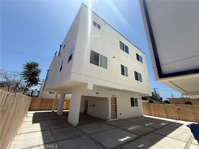5836 Ernest Ave, Los Angeles, CA 90034 - view of building exterior with a fenced backyard