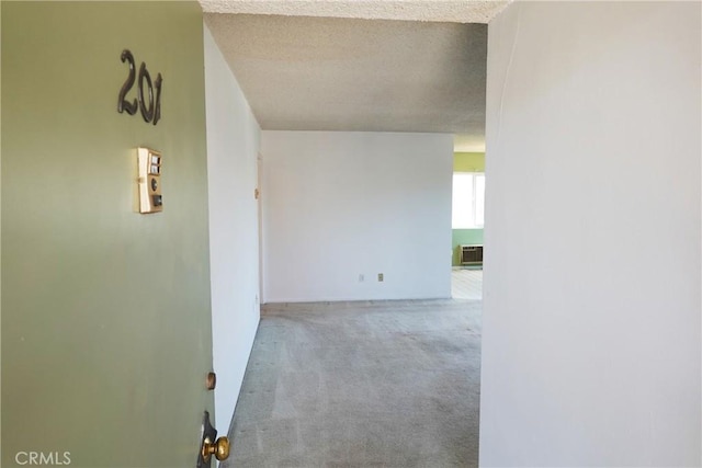 1754 N Kenmore Ave Unit 201, Los Angeles, CA 90027 - corridor with carpet and a textured ceiling