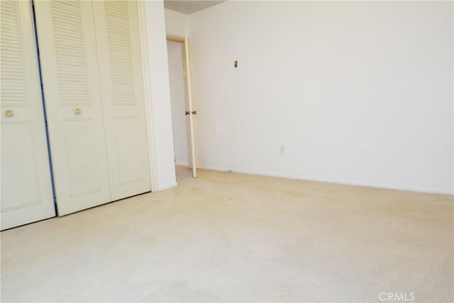 1754 N Kenmore Ave Unit 201, Los Angeles, CA 90027 - unfurnished bedroom featuring carpet floors and a closet