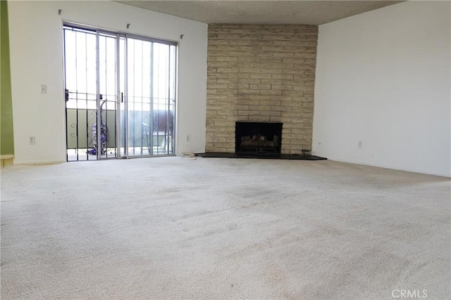 1754 N Kenmore Ave Unit 201, Los Angeles, CA 90027 - unfurnished living room featuring a fireplace and carpet floors