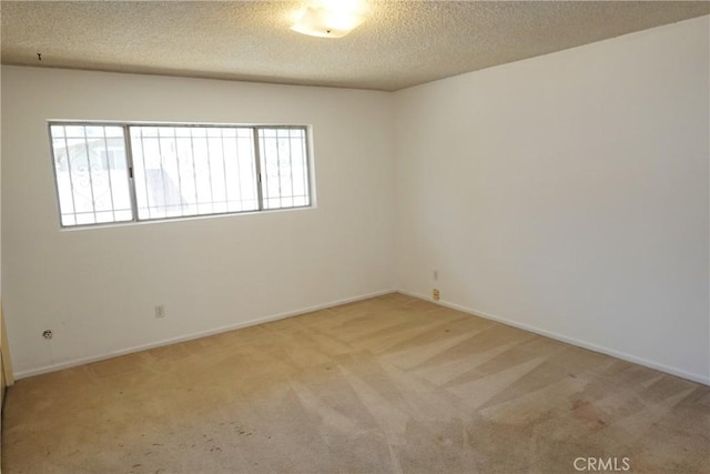 1754 N Kenmore Ave Unit 201, Los Angeles, CA 90027 - empty room with carpet, plenty of natural light, and a textured ceiling