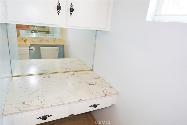 1754 N Kenmore Ave Unit 201, Los Angeles, CA 90027 - detailed view of white cabinetry and light stone countertops