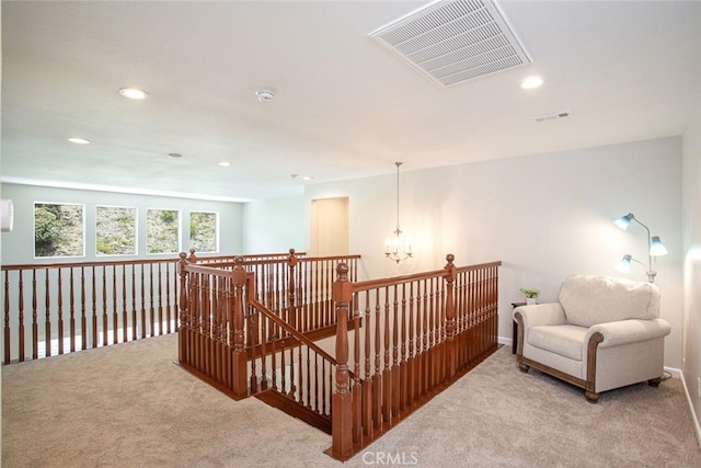 17122 Broken Rock Ct, Riverside, CA 92503 - hall with carpet floors, an upstairs landing, recessed lighting, and a chandelier