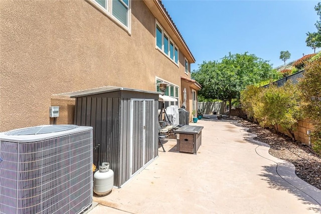17122 Broken Rock Ct, Riverside, CA 92503 - fenced backyard featuring a patio and a storage shed