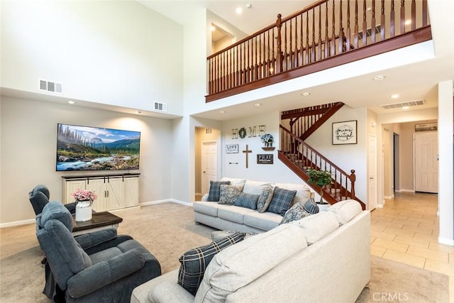 17122 Broken Rock Ct, Riverside, CA 92503 - living area featuring a towering ceiling, stairway, recessed lighting, carpet, and tile patterned flooring