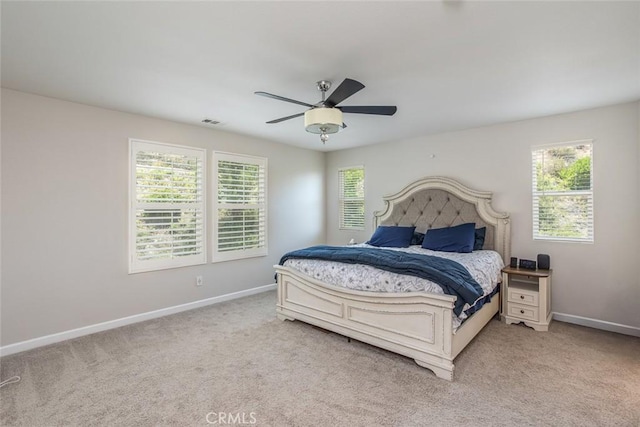 17122 Broken Rock Ct, Riverside, CA 92503 - carpeted bedroom with multiple windows and a ceiling fan