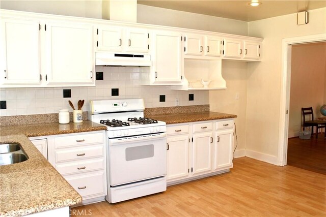 907 E Poppyfields Dr E, Altadena, CA 91001 - kitchen featuring white gas stove, premium range hood, light wood-style floors, and white cabinets