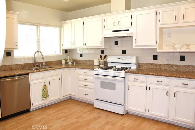 907 E Poppyfields Dr E, Altadena, CA 91001 - kitchen featuring white range with gas stovetop, stainless steel dishwasher, custom range hood, white cabinets, and light wood finished floors