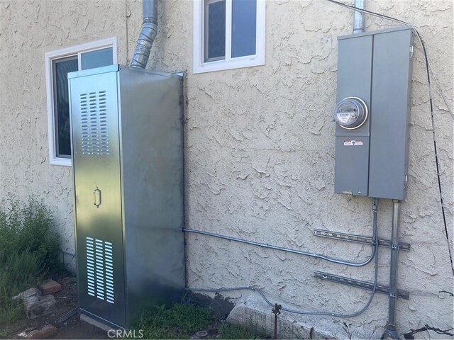 907 E Poppyfields Dr E, Altadena, CA 91001 - exterior view of stucco siding and electric meter