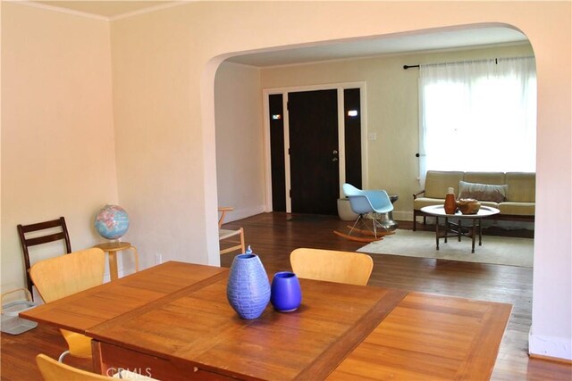 907 E Poppyfields Dr E, Altadena, CA 91001 - dining area with arched walkways, ornamental molding, and wood finished floors