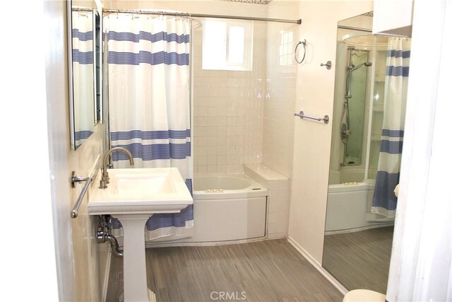 907 E Poppyfields Dr E, Altadena, CA 91001 - bathroom featuring shower / bath combo and wood finished floors