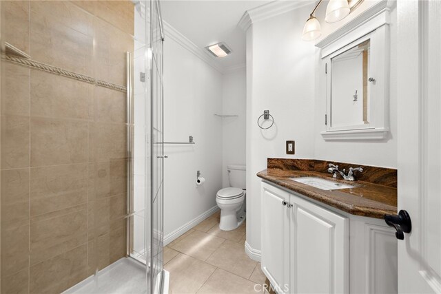 456 Avenida Seville Unit C, Laguna Woods, CA 92637 - full bathroom featuring a stall shower, vanity, ornamental molding, and tile patterned flooring