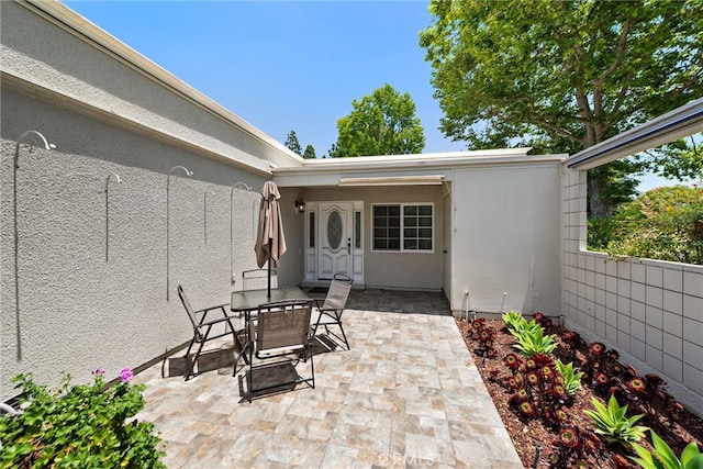 456 Avenida Seville Unit C, Laguna Woods, CA 92637 - view of patio / terrace featuring outdoor dining space