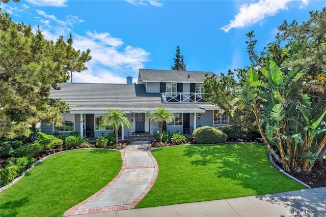1428 E Adams Ave, Orange, CA 92867 - traditional-style house featuring a porch and a front lawn