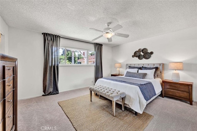 1428 E Adams Ave, Orange, CA 92867 - carpeted bedroom with a textured ceiling and a ceiling fan